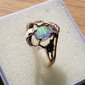 10K plum yellow gold faceted opal ring